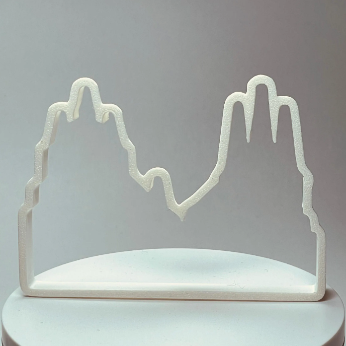 3D-gedruckte Ausstechform des Erfurter Doms und der Severikirche, um köstliche Weihnachtsplätzchen in Form der Wahrzeichen von Erfurt zu backen, hergestellt aus robustem, lebensmittelechtem Material.